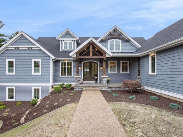 Entry way of a newly built light blue custom home