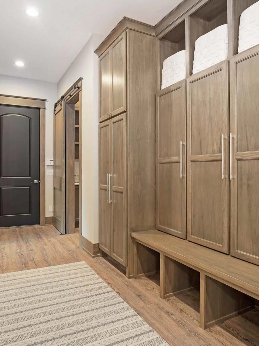 Custom built mudroom with four cubbies made of oak