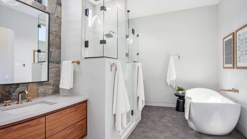 imgi_27_modern+master+bathroom.+floating+vanity.+stained+cabinetry.+tile+floor.+tile+shower.+soaker+tub