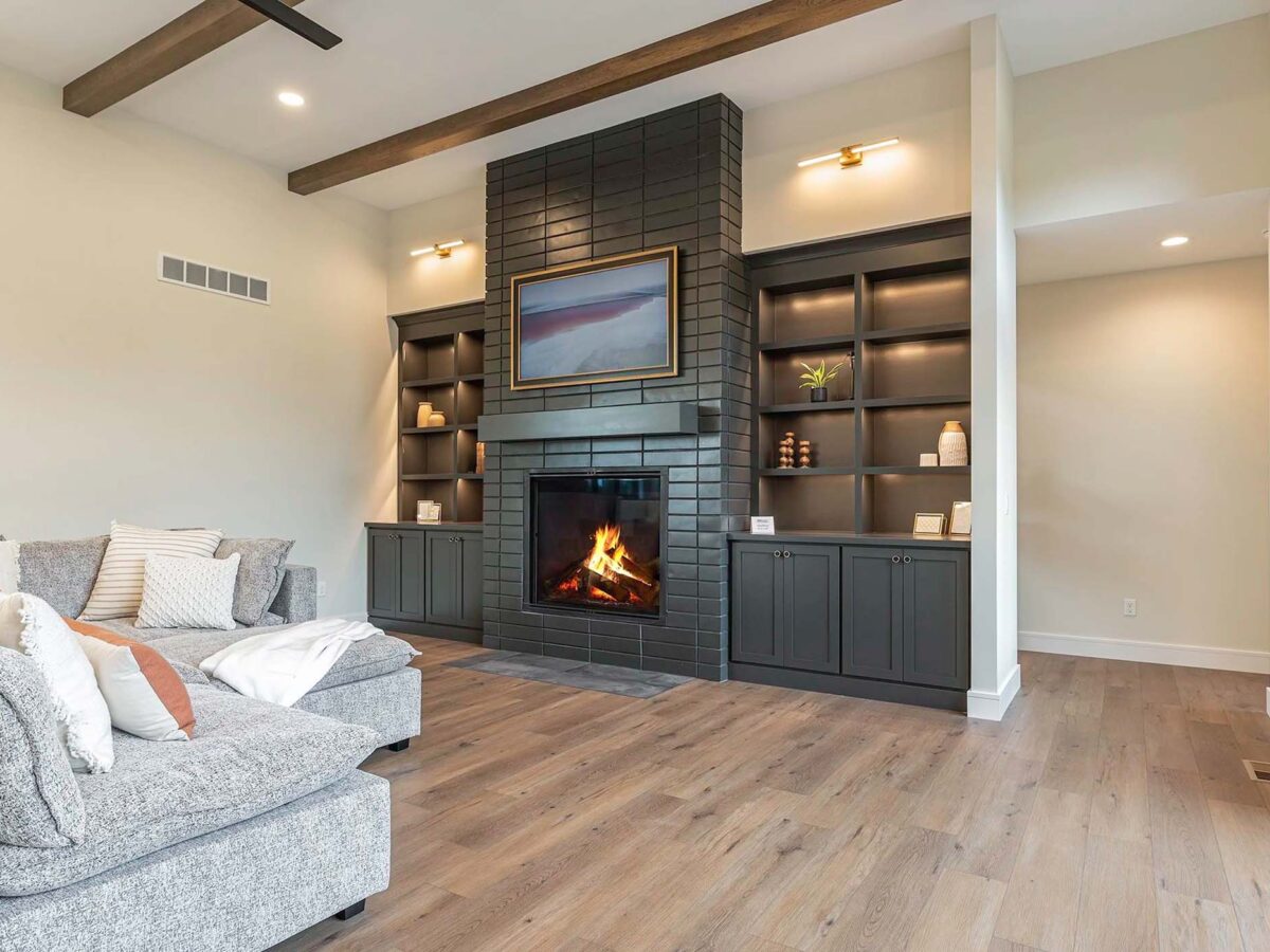 Modern living room with a custom black brick fireplace
